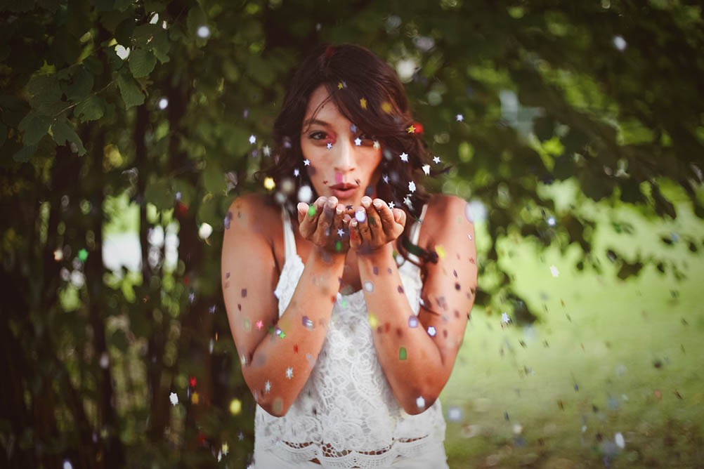 Canadian Lottery Winners: What Happened Next? Beautiful woman blows confetti from her hands